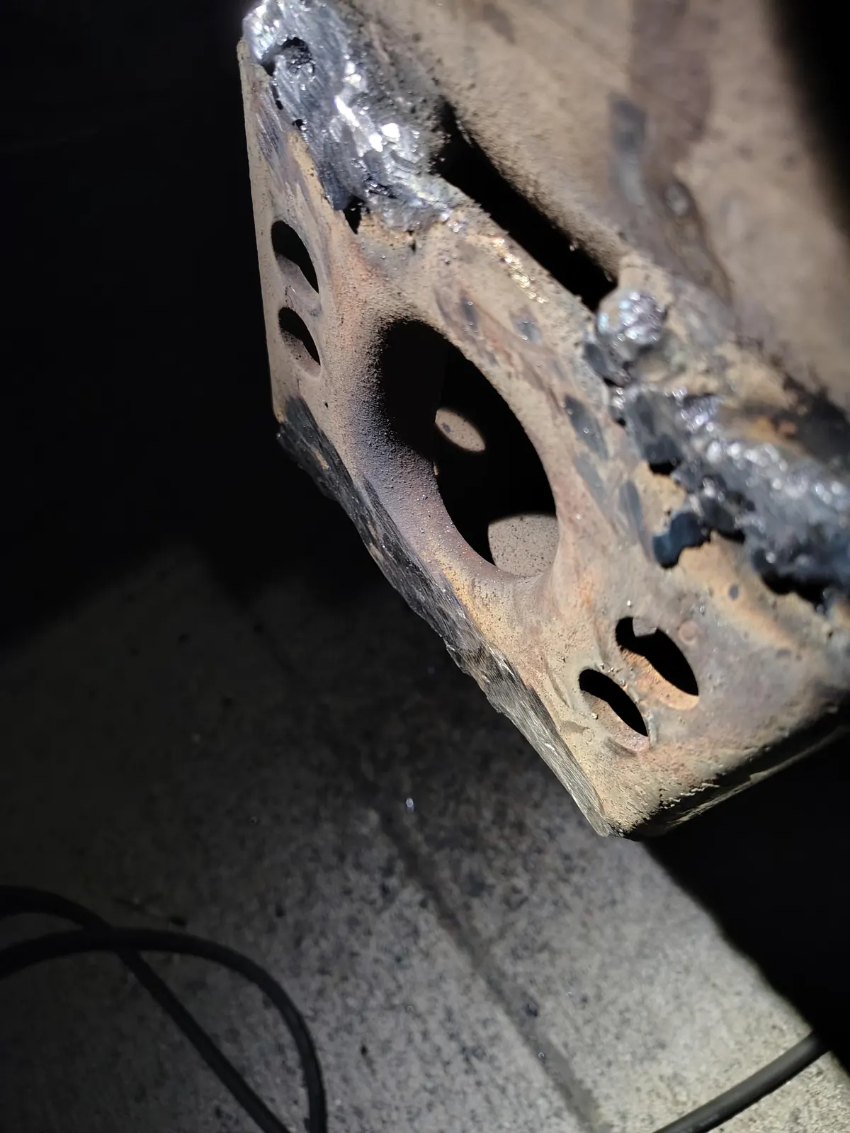 Close-up of a welded metal bracket